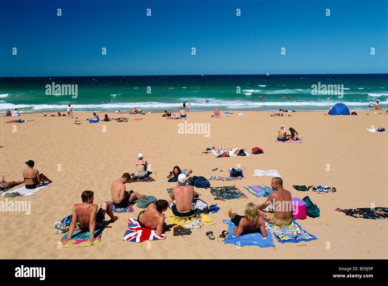 Groups of people on Palm Beach, at the northern point of the Sydney metropolitan area, New South Wales, Australia, Pacific Stock Photo