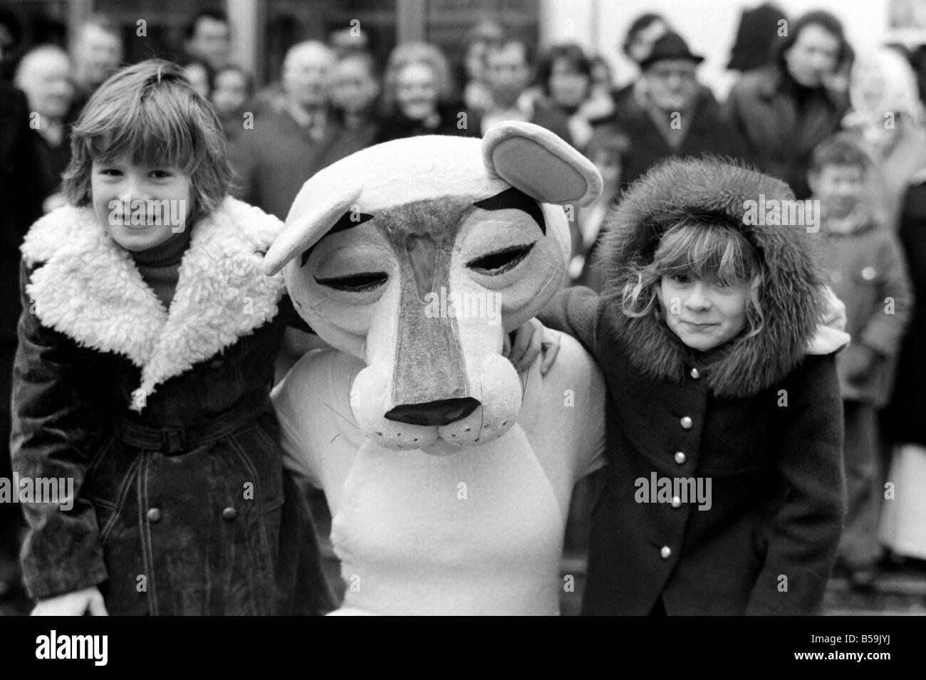 The Pinks and The Panthers. To celebrate the 'Return' of the famous bungling French Sleuth, Inspector ClouseauÖin the 'Pink Panther' a special showing of the film in London's Leicester Square, scores of film fans whose surnames are Pink or Panther were invited to see the new film. A girl in a ëPink Pantherí outfit welcomed the Pinks and the Panthers to London. Inspector Clouseau is played by Peter Sellers. Jason Pink and Dawn Panthers (both 8 yrs old) with the ëPink Pantherí after they saw the film with their parents today. These two youngsters applauded the film. January 1976 76-00056-004 Stock Photo