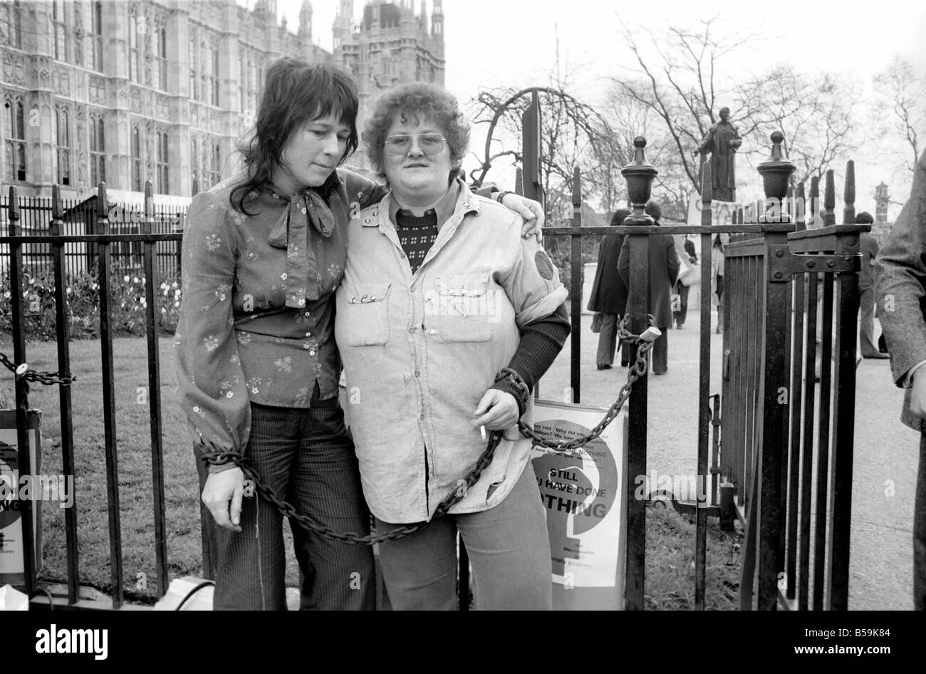 Members of the Womens Liberation Movement chained themselves to the railings at the statue of Sylvia Pankhurst. Police with bolt cutters cut away the protesters from the railings. ;April 1975 ;75-2043-009 Stock Photo