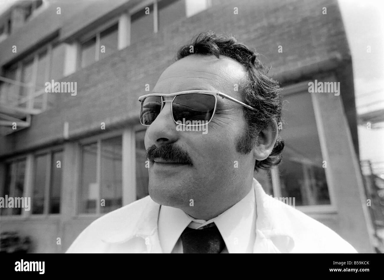 Mr. Irene Quaranta aged 39 with reflection of Concorde aircraft in his spectacles. &#13;&#10;April 1975 &#13;&#10;75-2072-019 Stock Photo