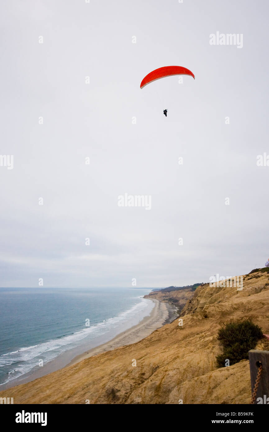 Paraglider sailing above Black's Beach at the Torrey Pines Gliderport ...
