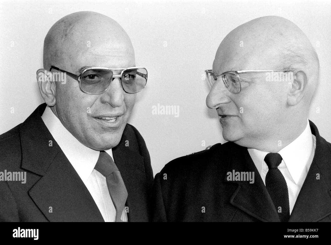 American actor Telly Savalas (left) who plays Kojak in the television series, pictured at Capital Radio Headquarters at Euston Tower, London, ;April 1975 ;75-2087-007 Stock Photo