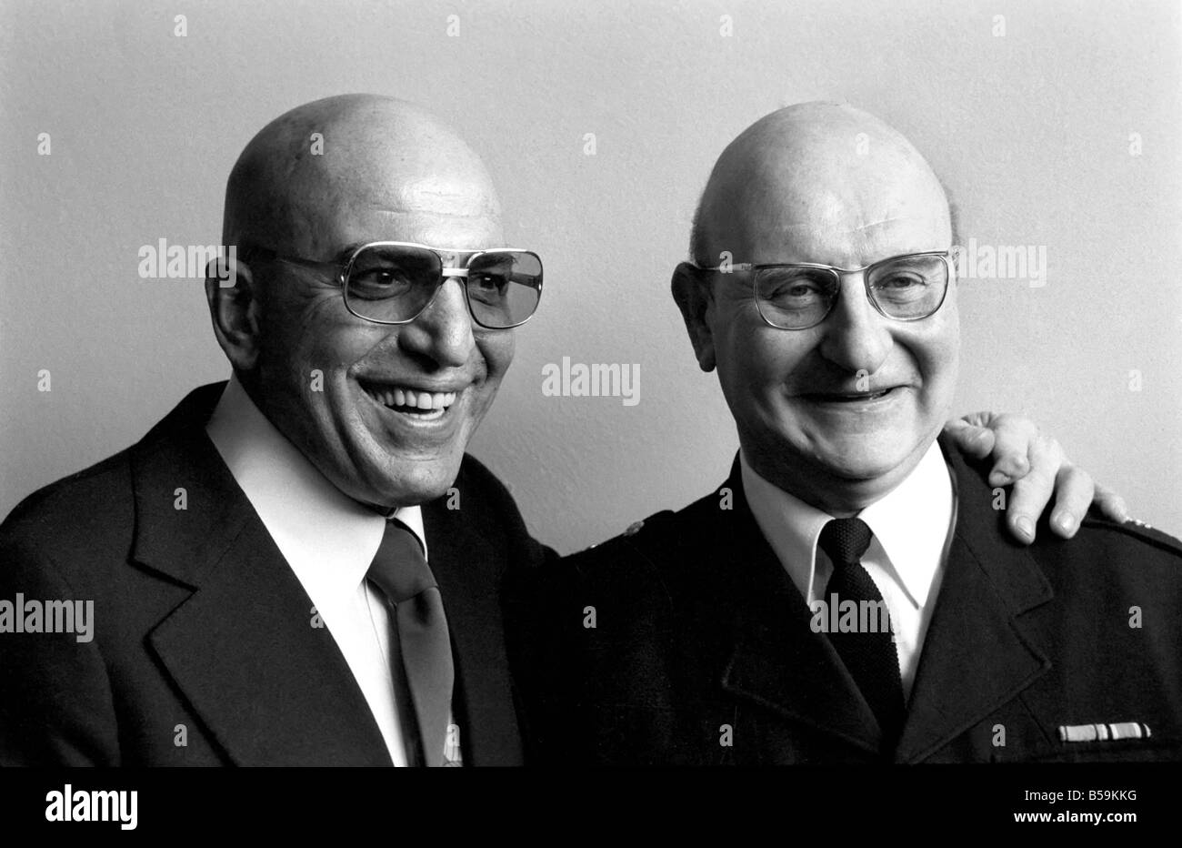 American actor Telly Savalas (left) who plays Kojak in the television series, pictured at Capital Radio Headquarters at Euston Tower, London, ;April 1975 ;75-2087-012 Stock Photo