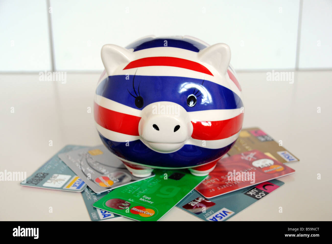 British Sterling piggy bank painted in the colours of the British red