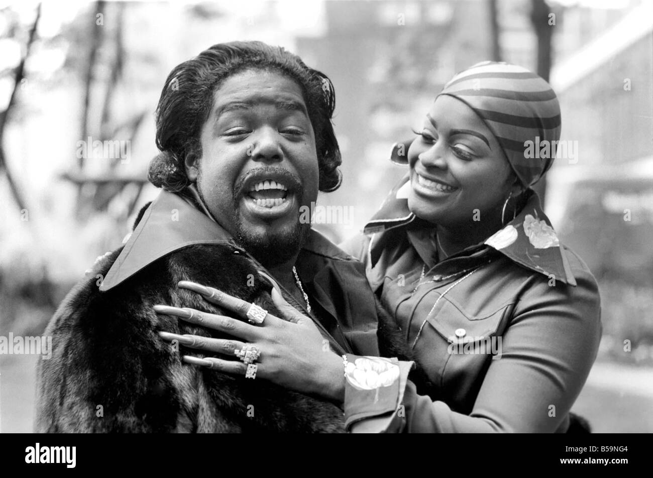 Pop star Barry White with his wife Goldean displaying her affections and  her long finger nails. May 1975 Stock Photo - Alamy
