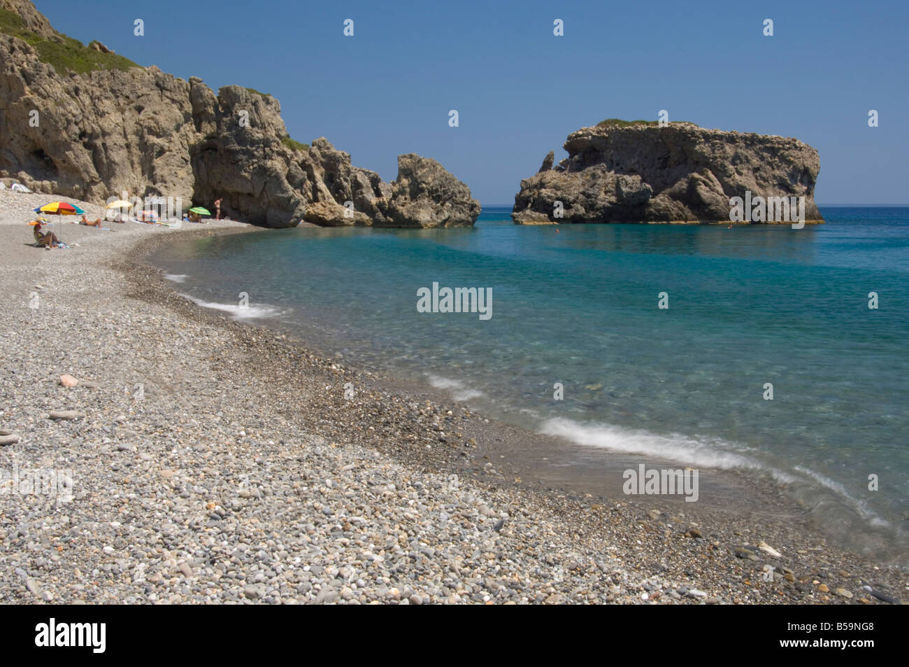 The pebble beach and emerald seas at Sougia on the south coast of Crete Greek Islands Greece Europe Stock Photo