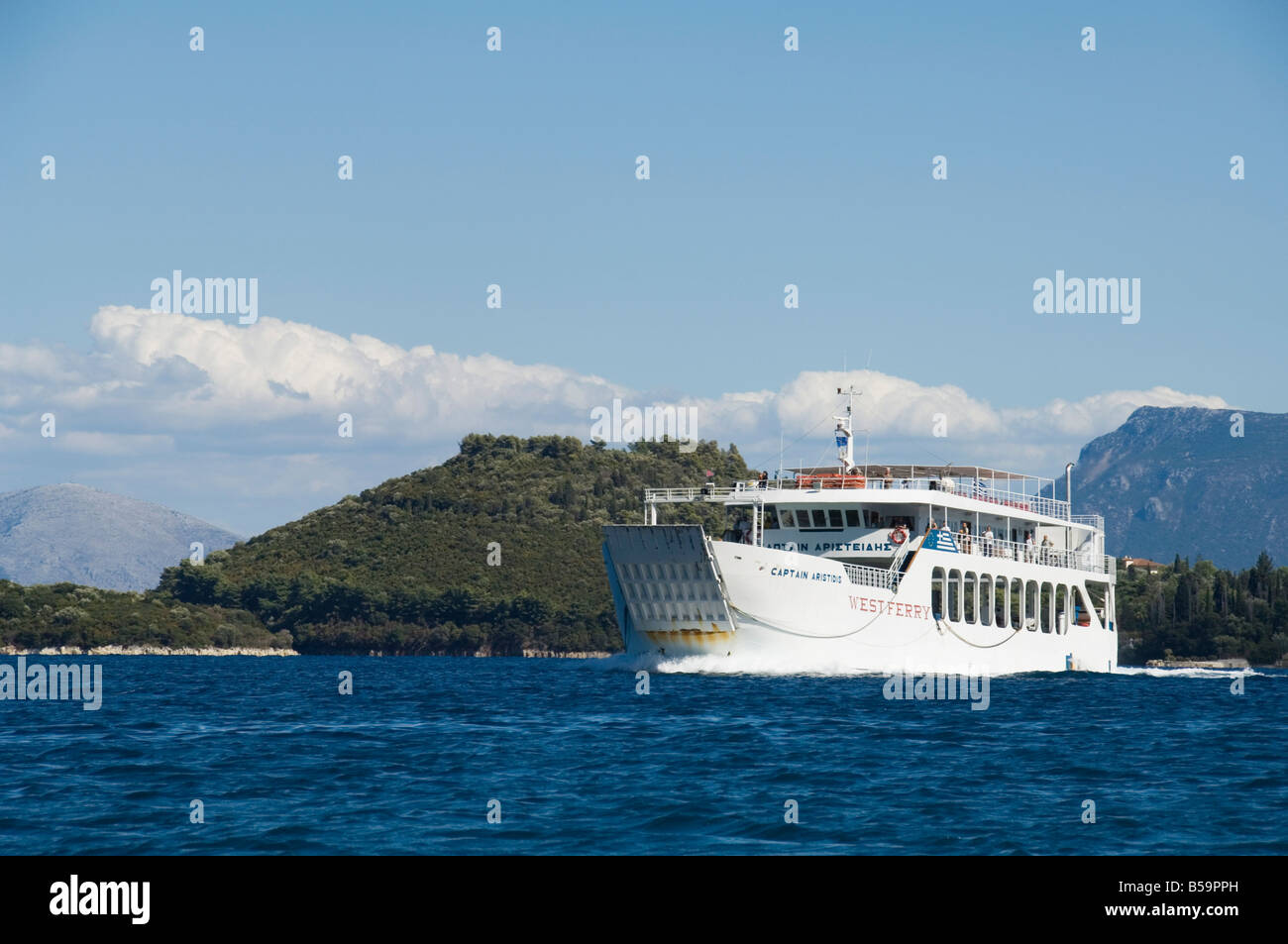 Ferry passing the Island of Skorpios owned by the Onassis family, near Lefkada (Lefkas), Ionian Islands, Greek Islands, Greece Stock Photo