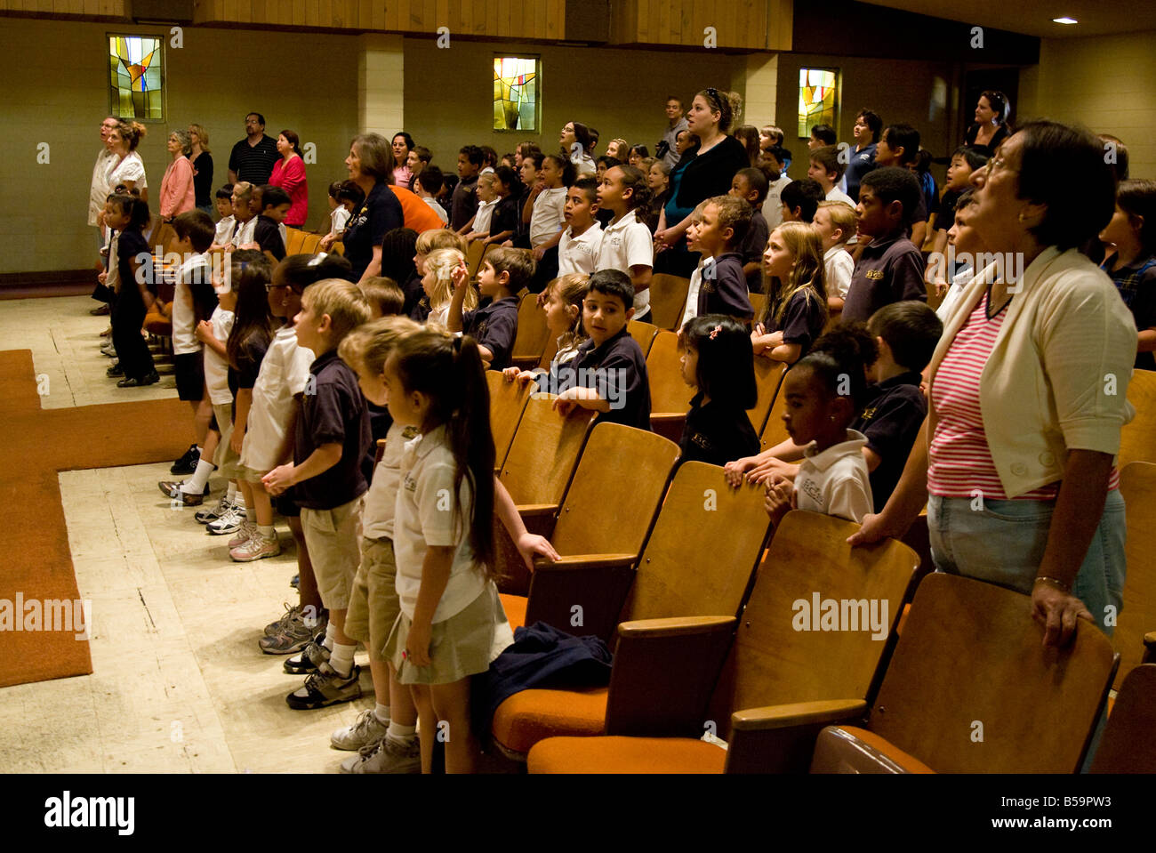 Elementary School Children at Chapel Assembly Stock Photo
