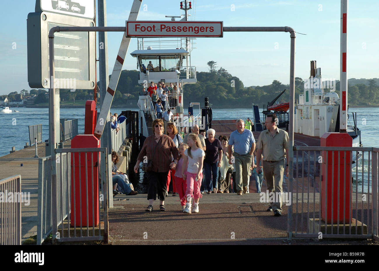 Foot passengers getting off the Strangford Ferry at Portaferry Strangford Lough Stock Photo