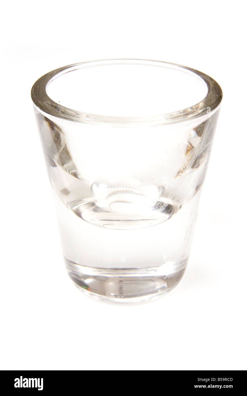 Empty shot glass isolated on a white studio background Stock Photo - Alamy