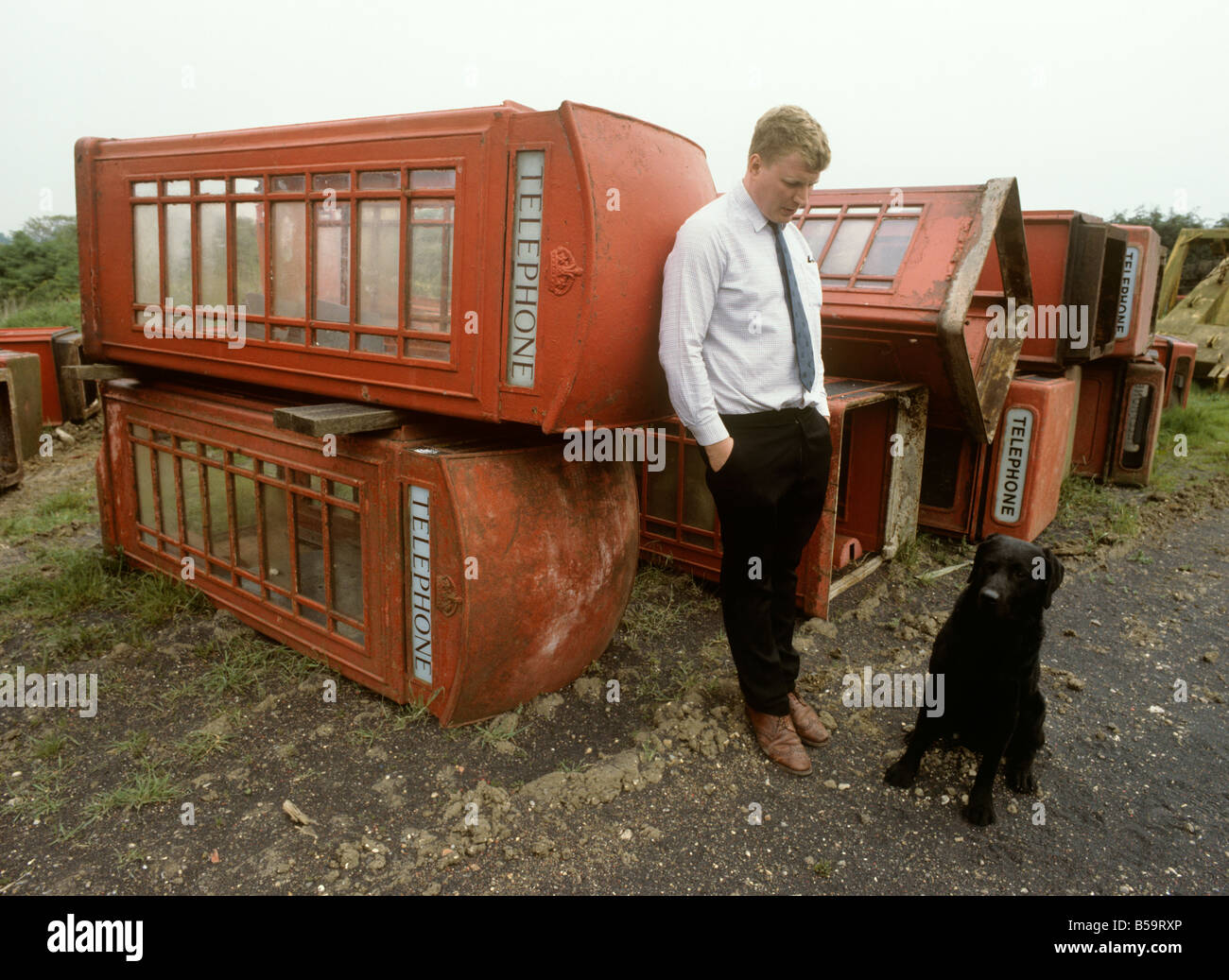UK England Essex Fyfield Willy White with old phone boxes for sale Stock Photo