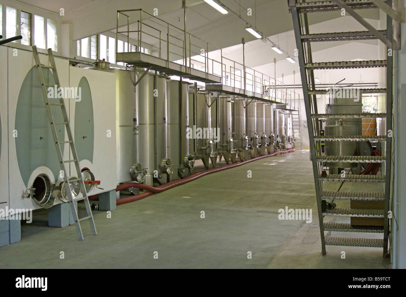 Wine fermentation and storage tanks Ghizzano Tuscany Italy Stock Photo