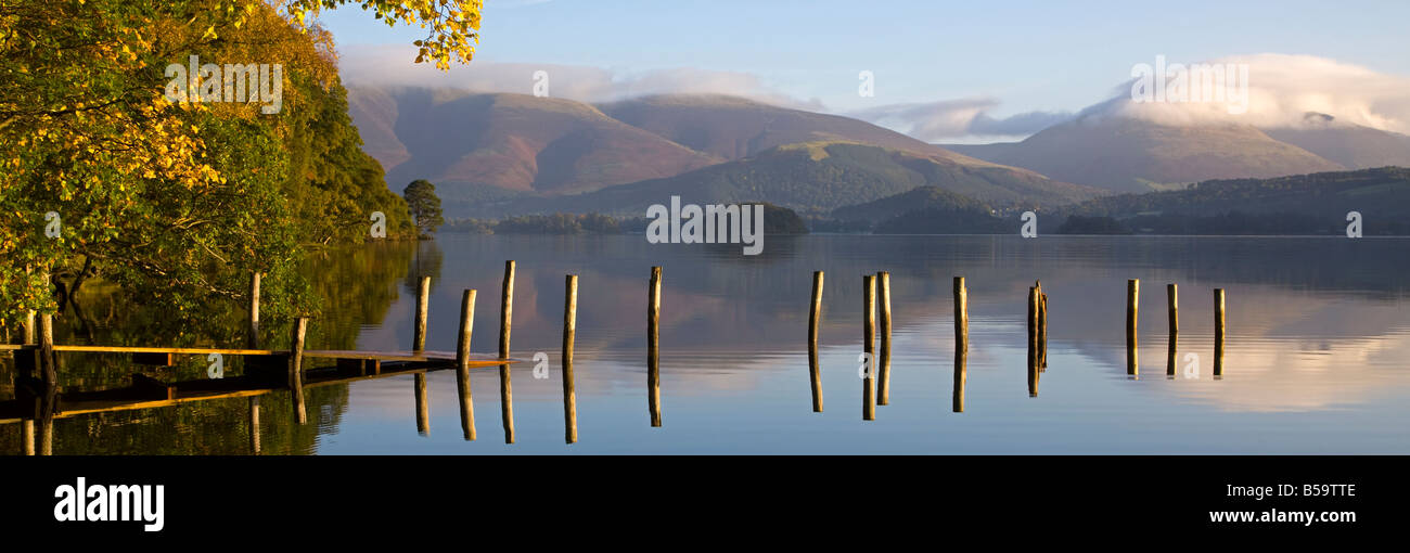View over submerged landing stage at Derwentwater towards Skiddaw & Blencathra in Autumn, Keswick, Lake District, Cumbria Stock Photo