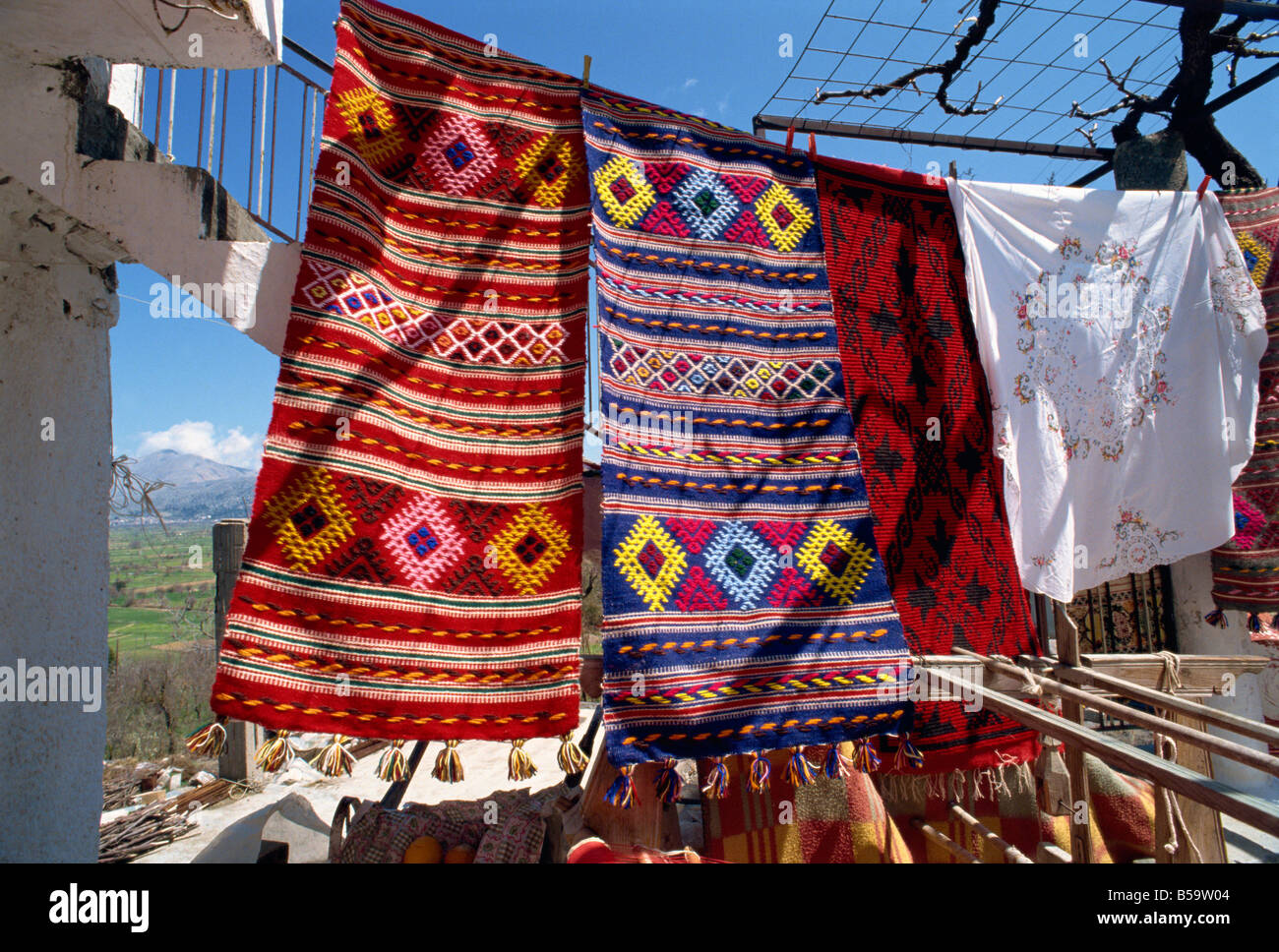 Textiles for sale in village near Lasithi Plateau Crete Greek Islands Greece Europe Stock Photo
