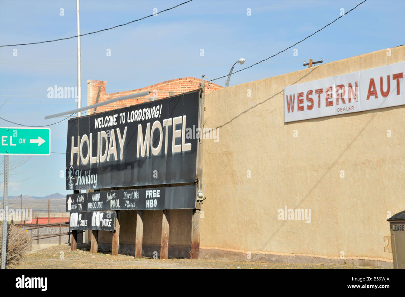 The vacant Holiday Motel in Lordsburg, boarded up Stock Photo Alamy
