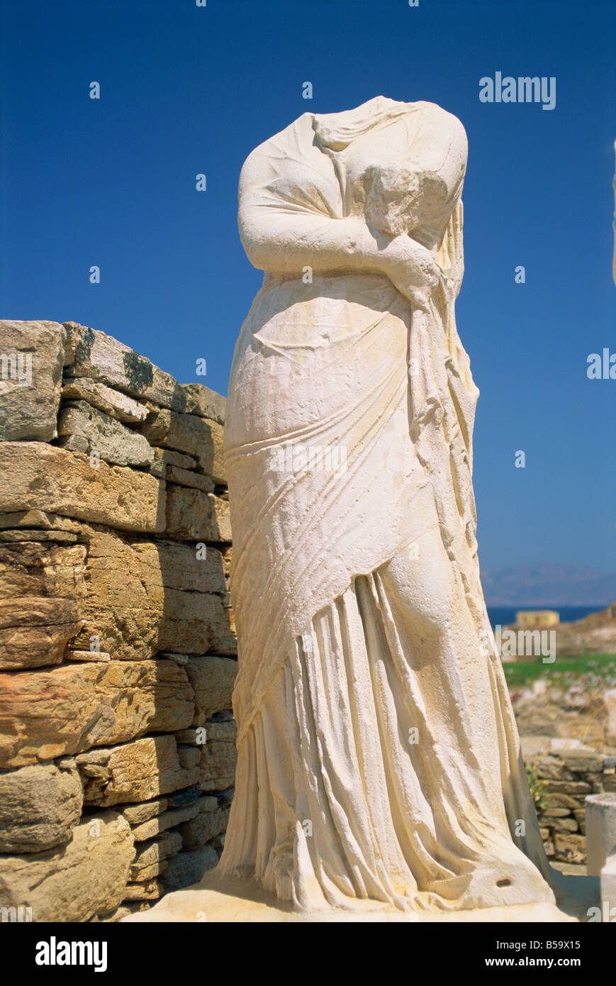 Headless statue of Cleopatra Delos UNESCO World Heritage Site Cyclades Islands Greek Islands Greece Europe Stock Photo