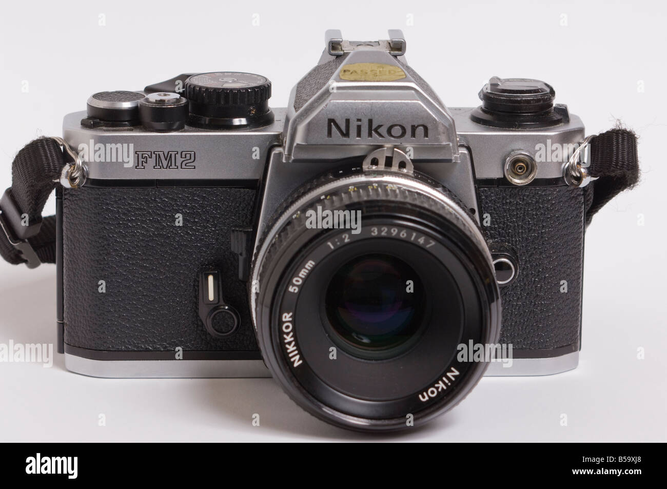 A Professional Nikon FM2 manual 35mm film camera in silver with