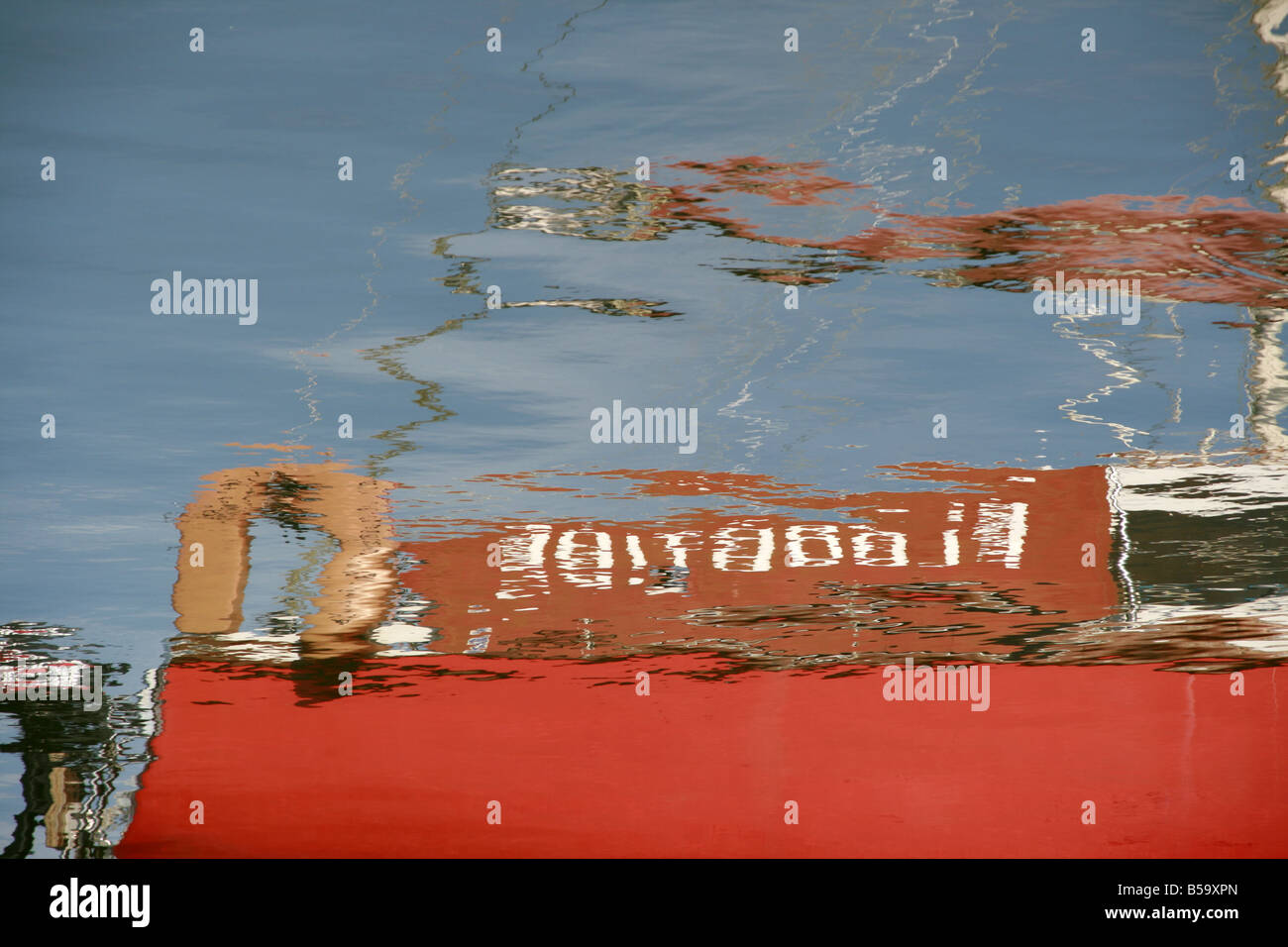 abstract reflection of one boat in water in sea Stock Photo - Alamy