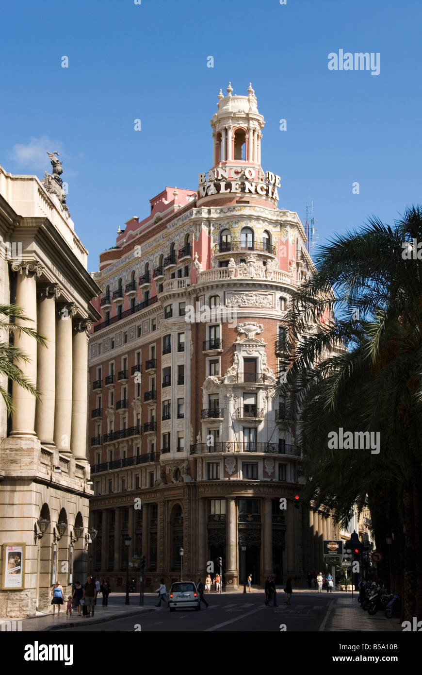 Landmark pink building of Banco de Valencia on Calle de Don Juan de Austria in Valencia Spain Stock Photo