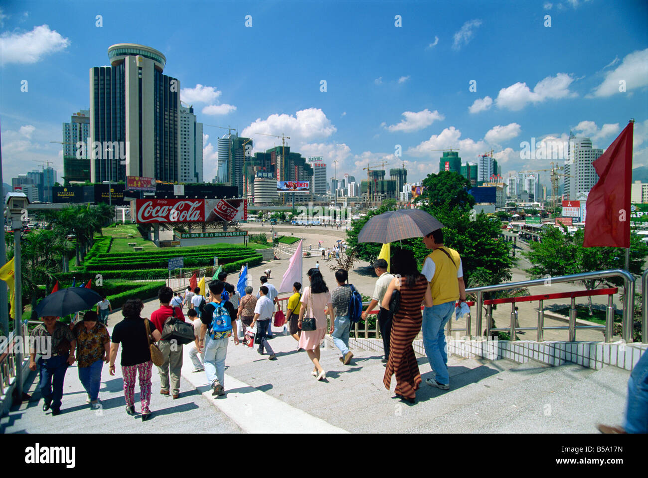 Street scene of pedestrian walkway Shenzhen City in the Special Economic Zone boomtown on border with Hong Kong Stock Photo