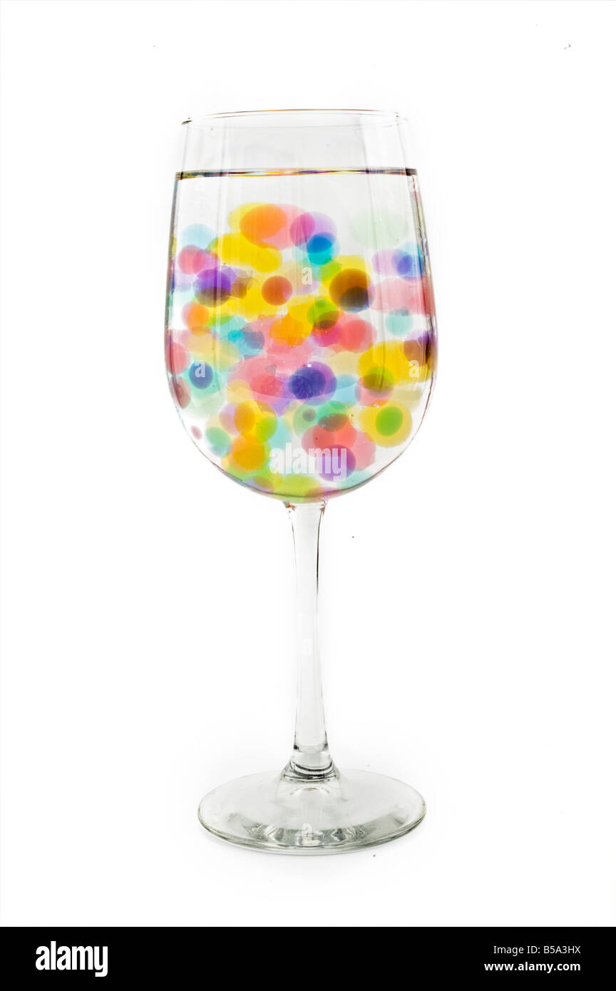 wine glass with colored bubbles Stock Photo Alamy
