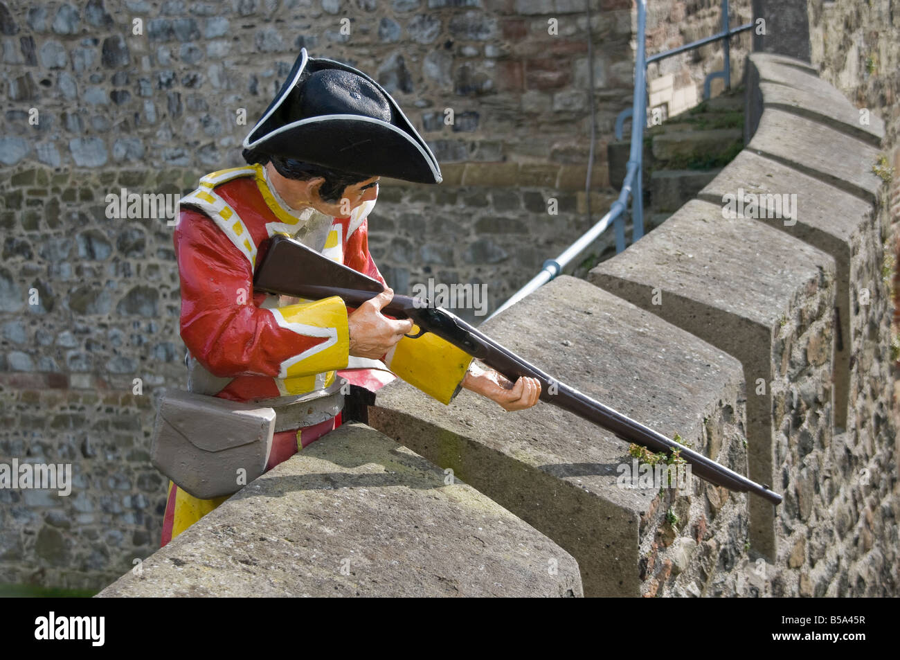 Fibreglass model of a 18th century redcoat soldier with rifle Stock Photo