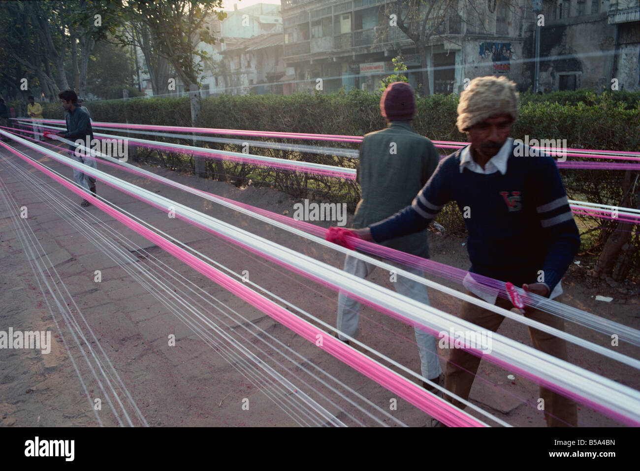 Kite string production, string is coated in ground glass for fighting