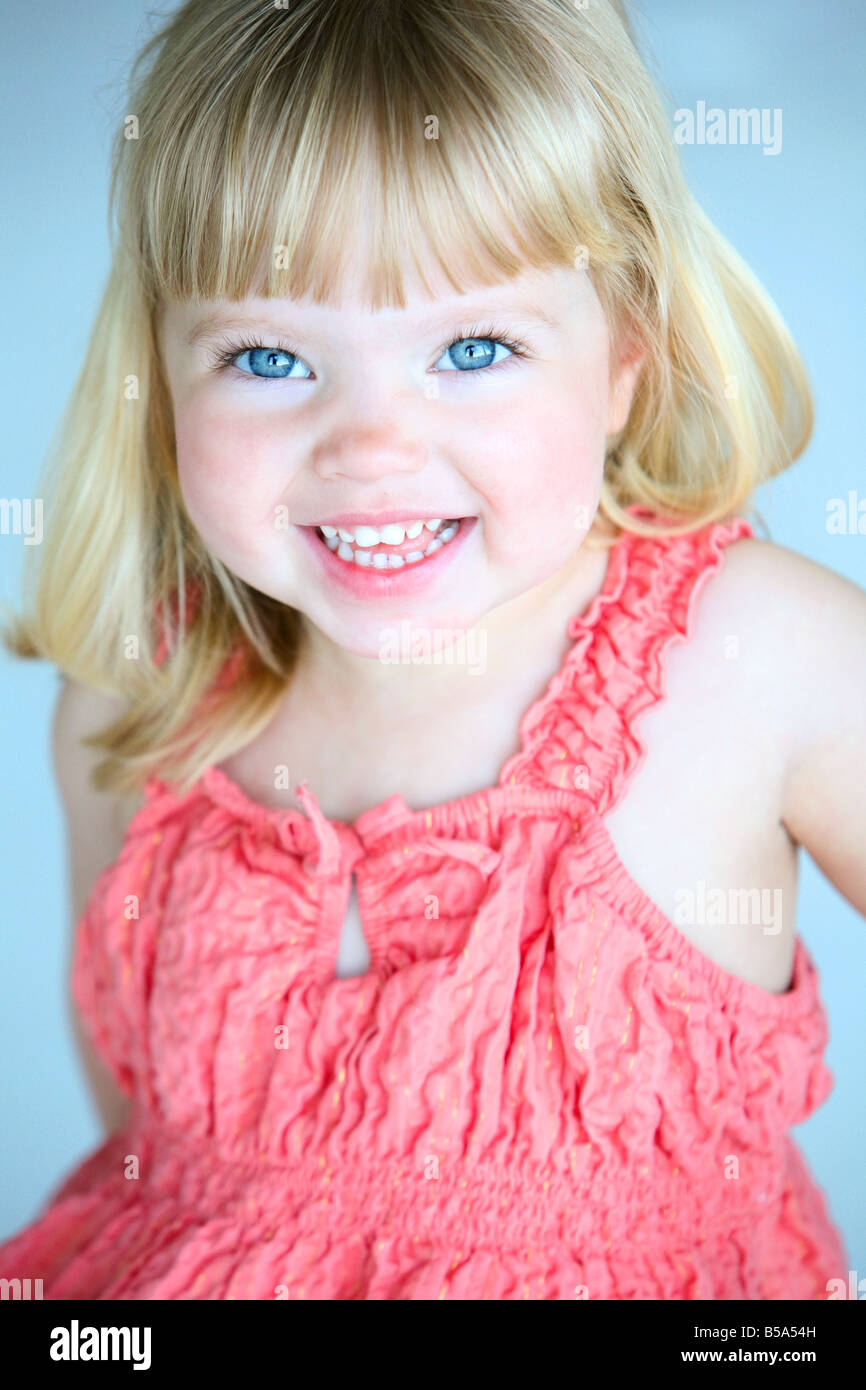 Little girl in a pink dress Stock Photo - Alamy