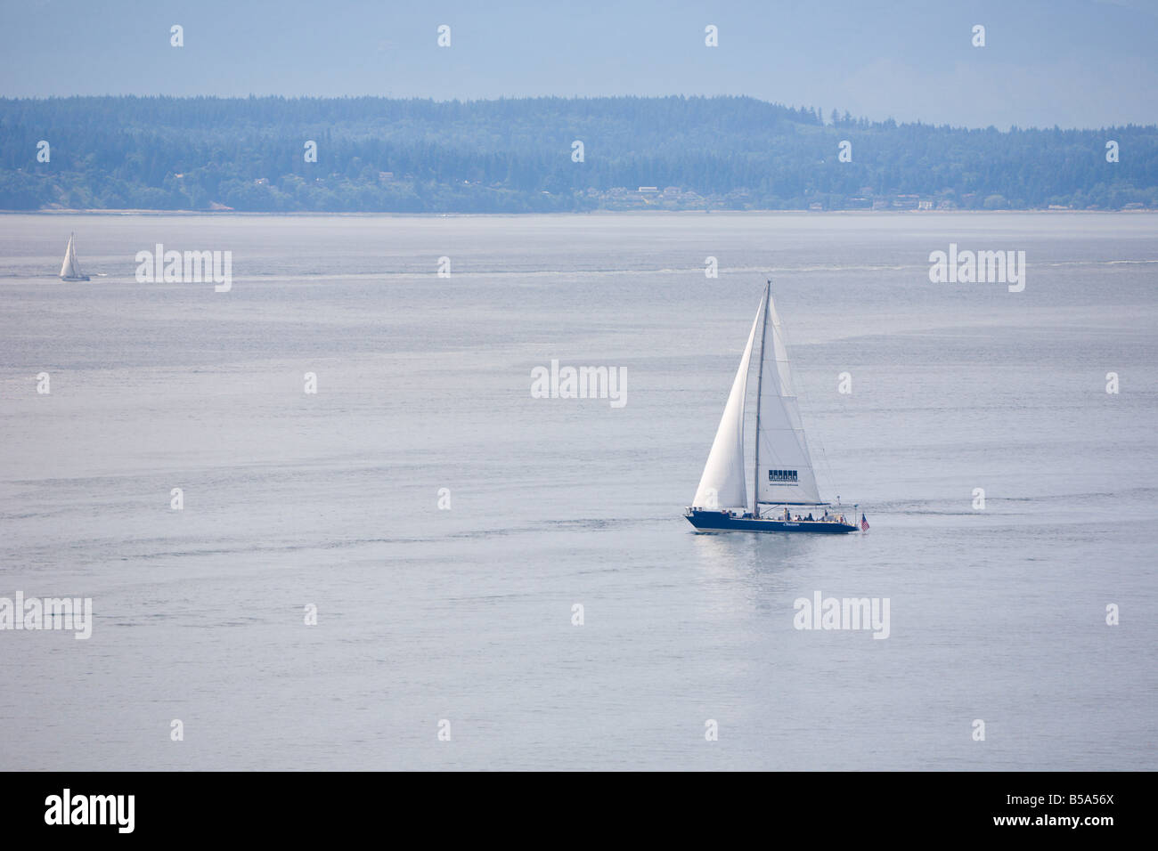 Large sailboat Obsession sailing on Elliot Bay in Seattle Stock Photo