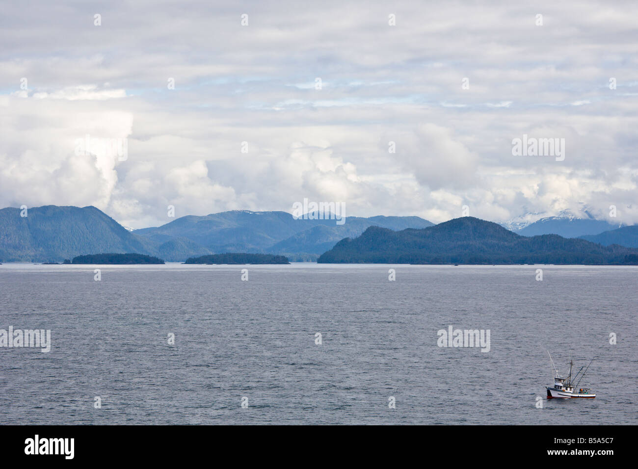 Commercial fishing boat trawling the waters of the Inside Passage between Seattle, WA and Alaska Stock Photo