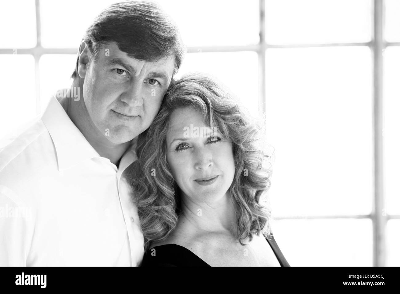 Indoor middle aged Black and White Stock Photos & Images - Alamy
