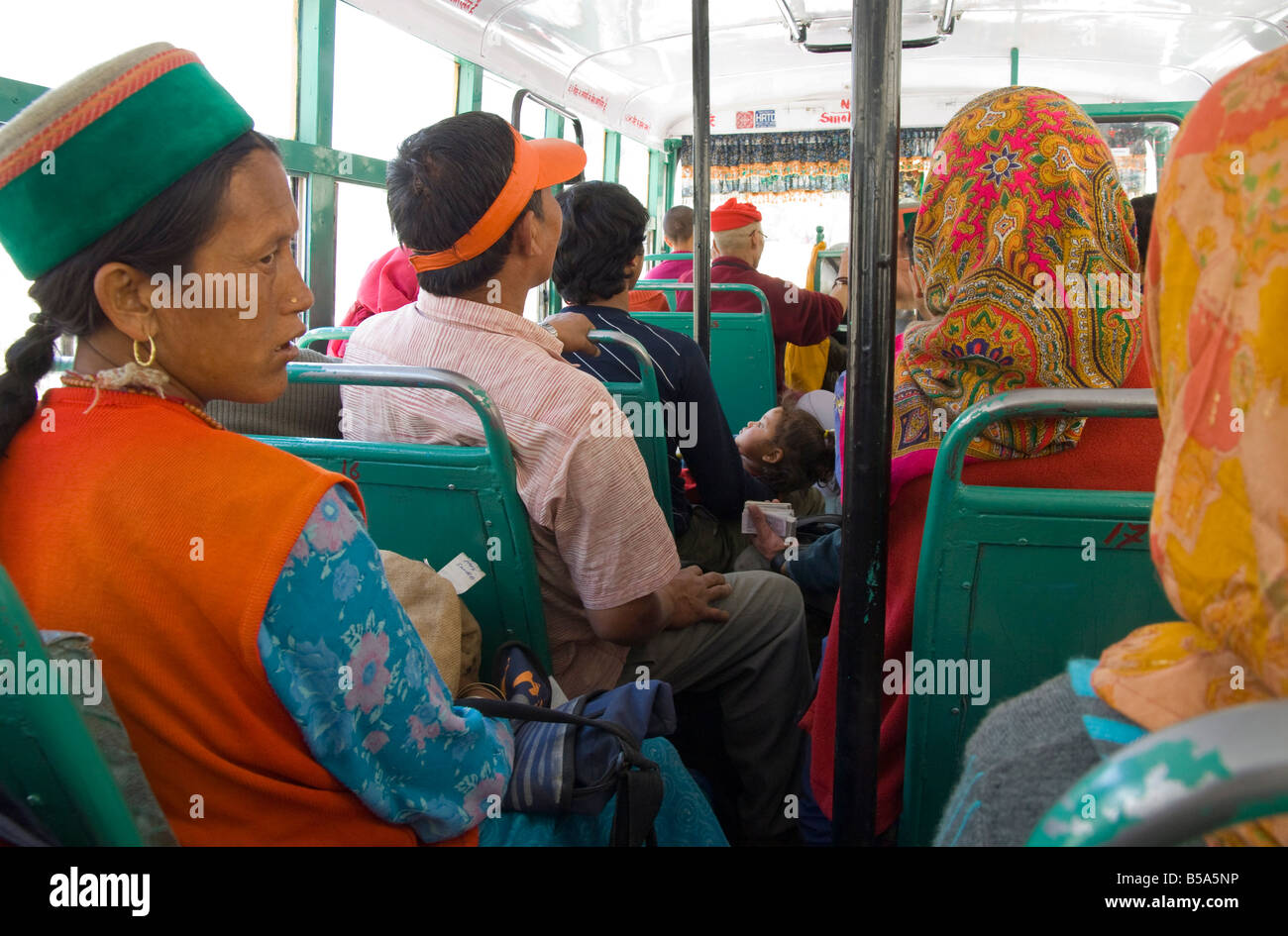 Group of local people travelling in a local public bus, Spiti, Himachal Pradesh, India Stock Photo