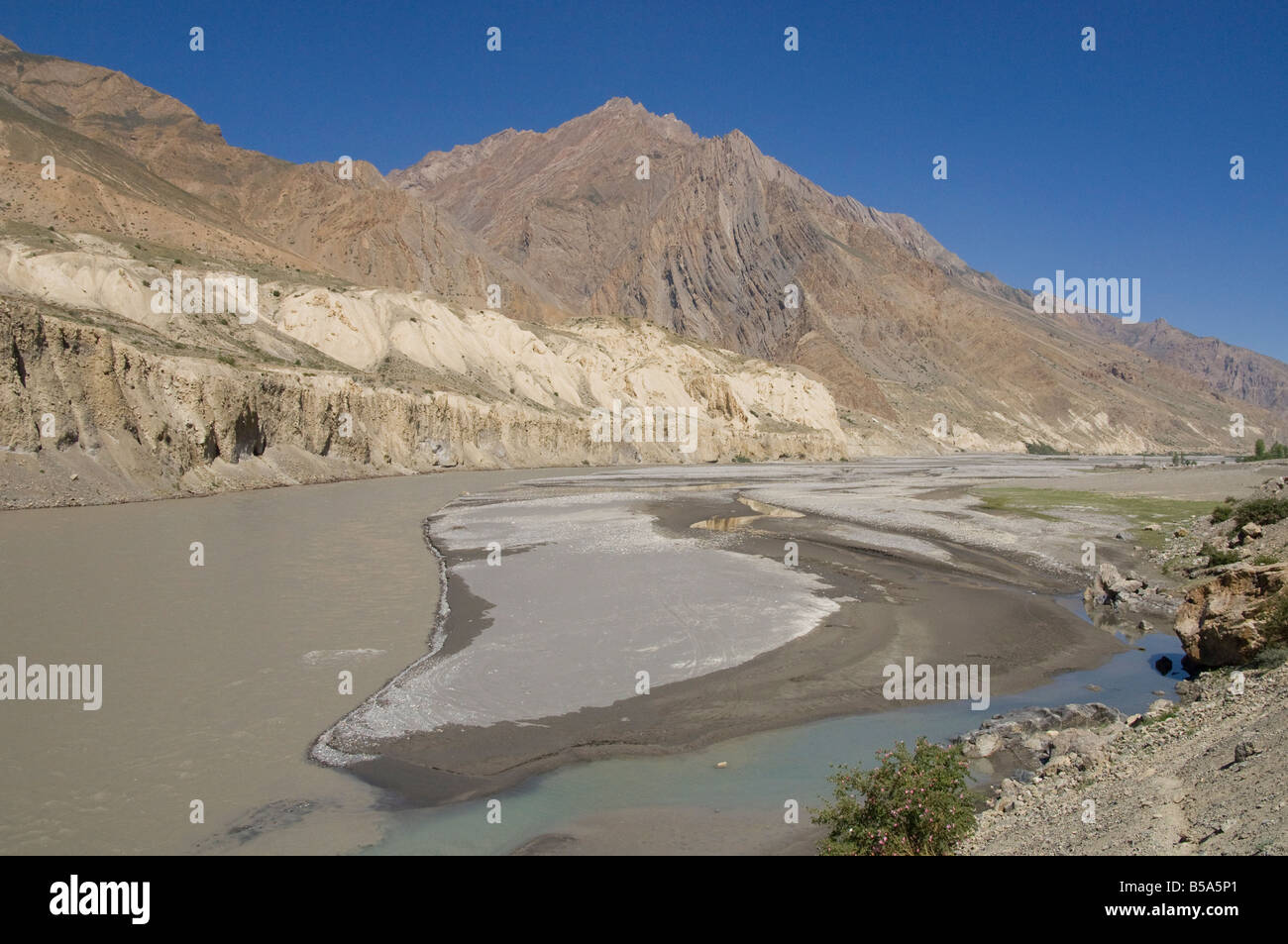 Waters from snow melting and mountains in background, on road between Tabo and Kaza, Spiti River, Spiti, Himachal Pradesh, India Stock Photo