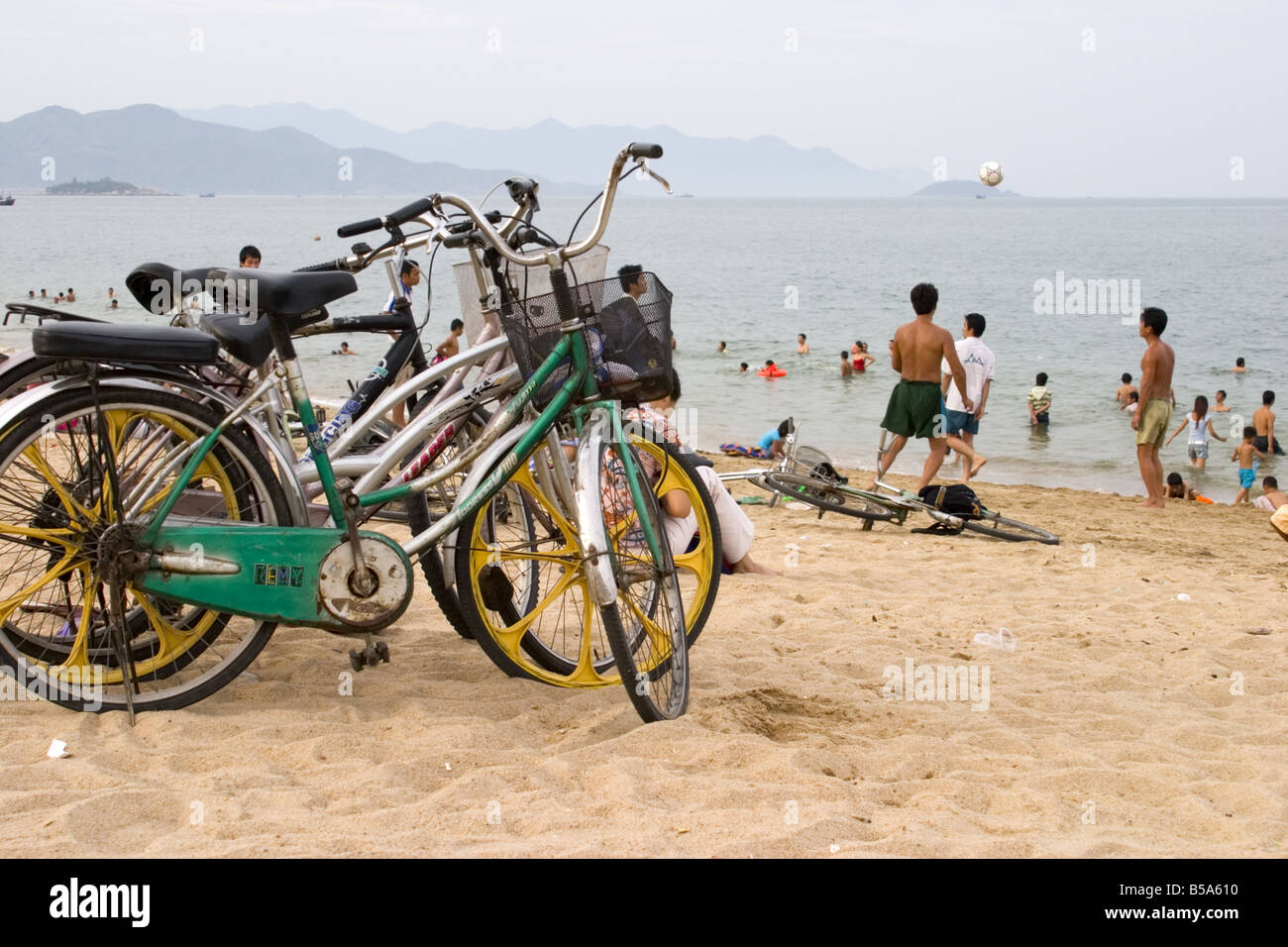 Bicycles on Na Trang beach, Vietnam Stock Photo