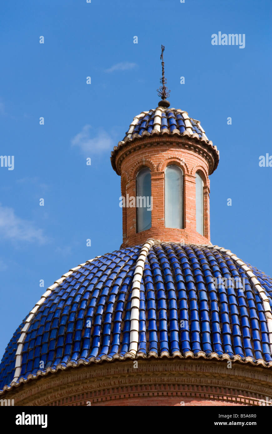 Blue ceramic tiled church dome in the old historical centre of El Carmen in Valencia Spain Stock Photo