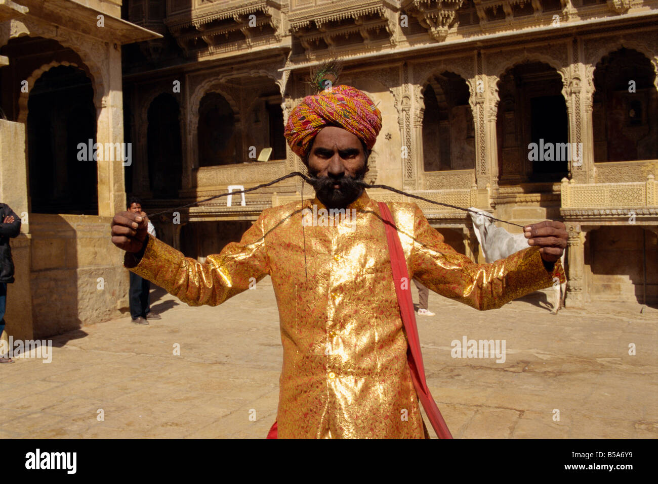 Man with a very very long moustache Jaisalmer Rajasthan state India Asia Stock Photo