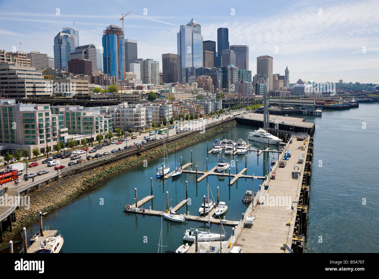 Small marina in front of skyscrapers along waterfront area of Seattle Washington Stock Photo