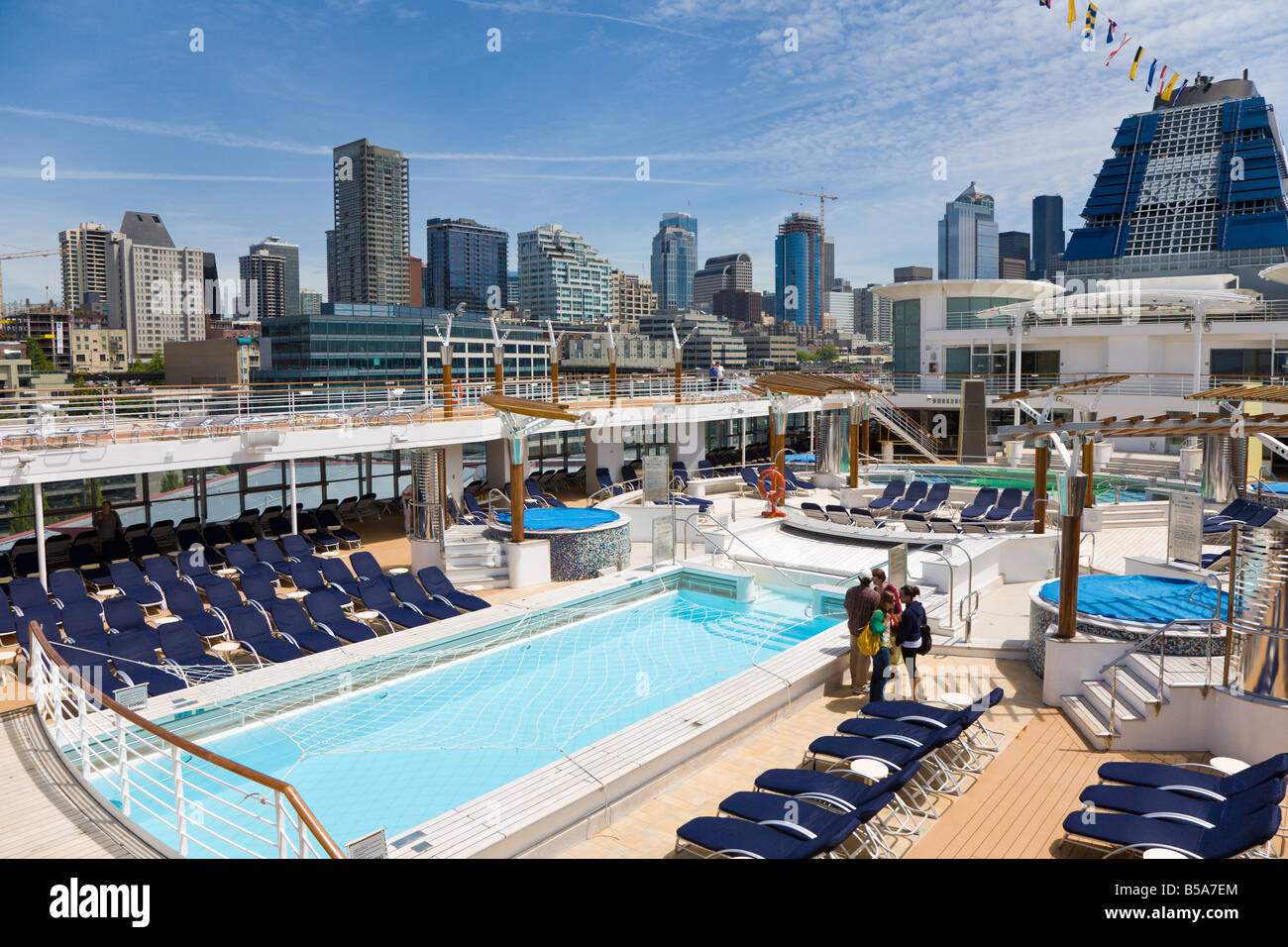 Seattle city skyline behind pool deck of cruise ship in port of Seattle Stock Photo
