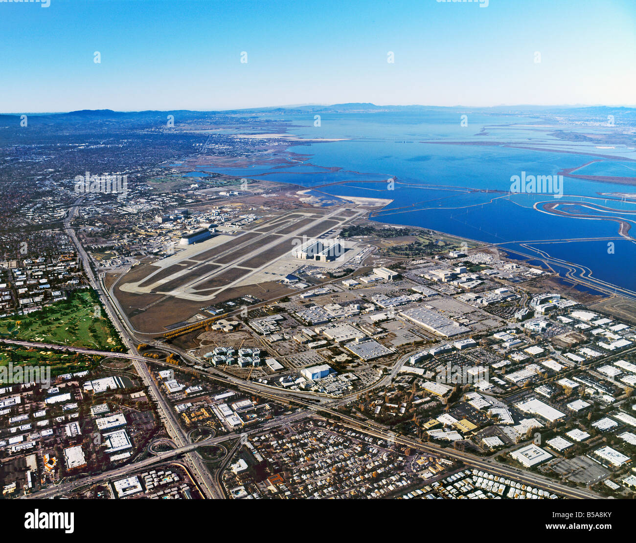 aerial view above Sunnyvale California Silicon Valley Moffett Field airport and Bayshore Freeway including Lockheed Martin Stock Photo