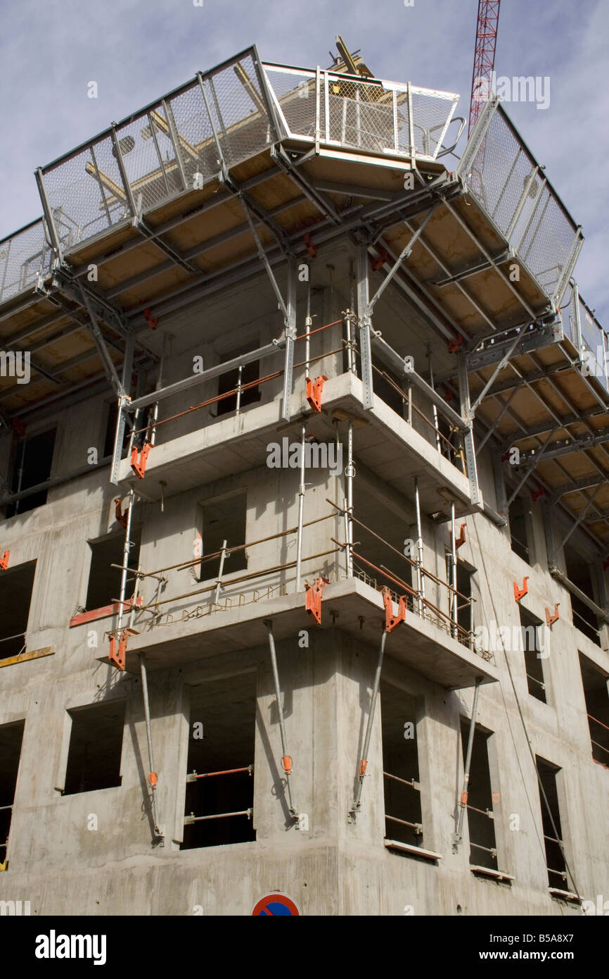 Concrete building under construction. Can be used as concept for economic growth, development, booming economy, investment in property and real estate Stock Photo