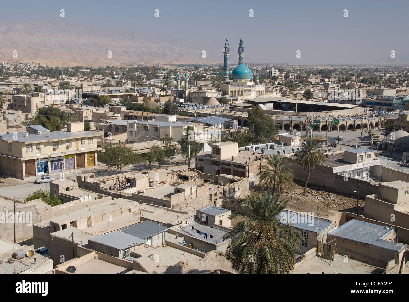 Main mosque and new souk in centre of desert town Lar city Fars province southern Iran Middle East Stock Photo