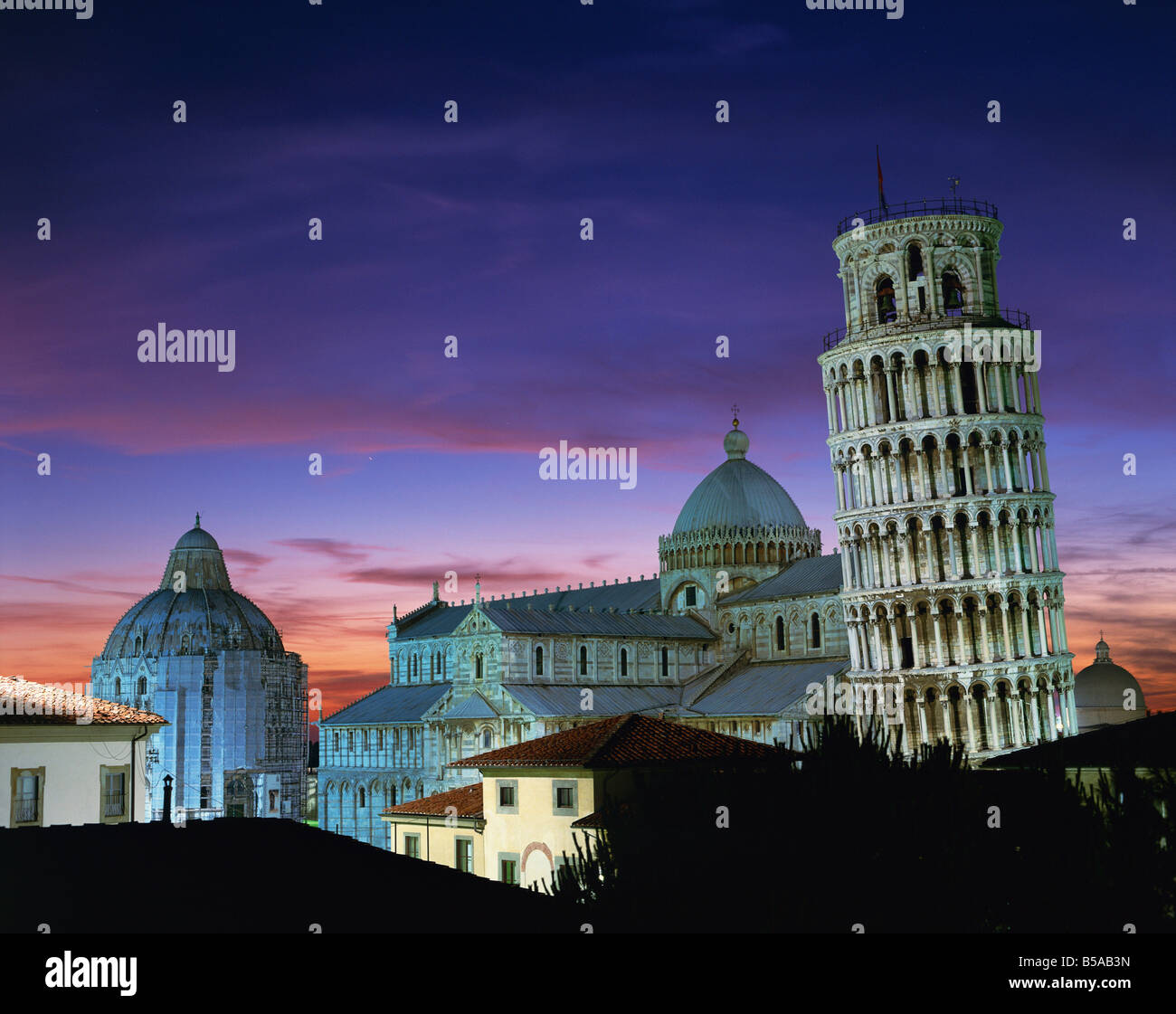 The Leaning Tower Duomo and Baptistery at sunset in the city of Pisa UNESCO World Heritage Site Tuscany Italy Europe Stock Photo