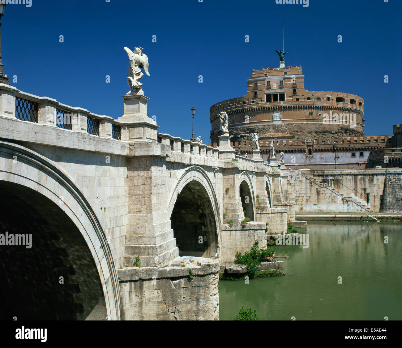 Ponte S Angelo over the River Tevere and Castle in the city of Rome Lazio Italy Europe Stock Photo
