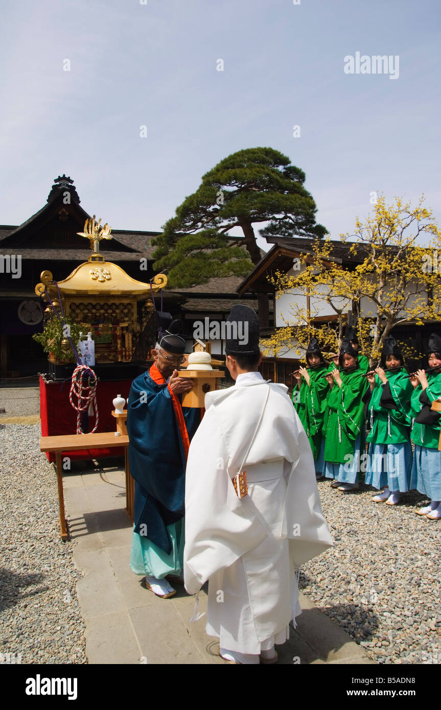 Priests in ritual procession at Takayama spring festival, Honshu Island, Japan Stock Photo