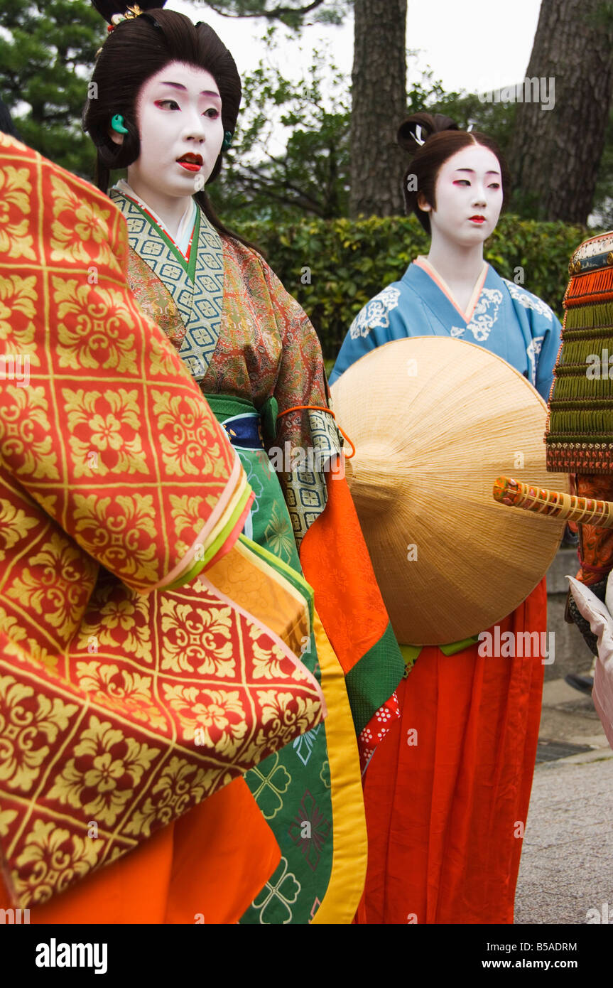 Women in traditional costume of court mistresses, Kyoto, Honshu Island, Japan Stock Photo
