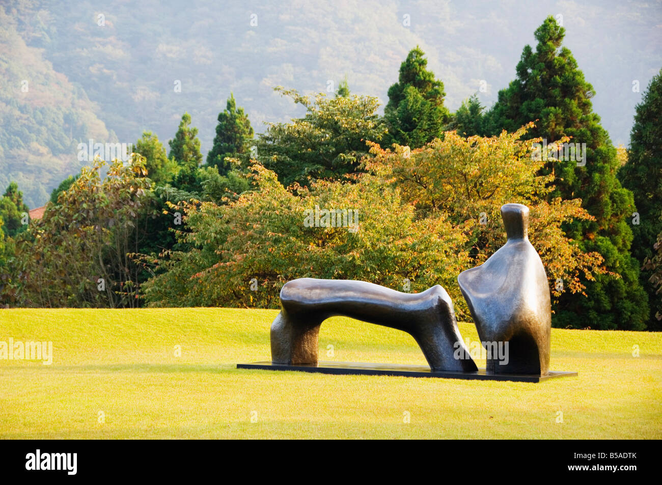 A reclining bronze sculpture at Chokokunomori Sculpture Park, Kanagawa
