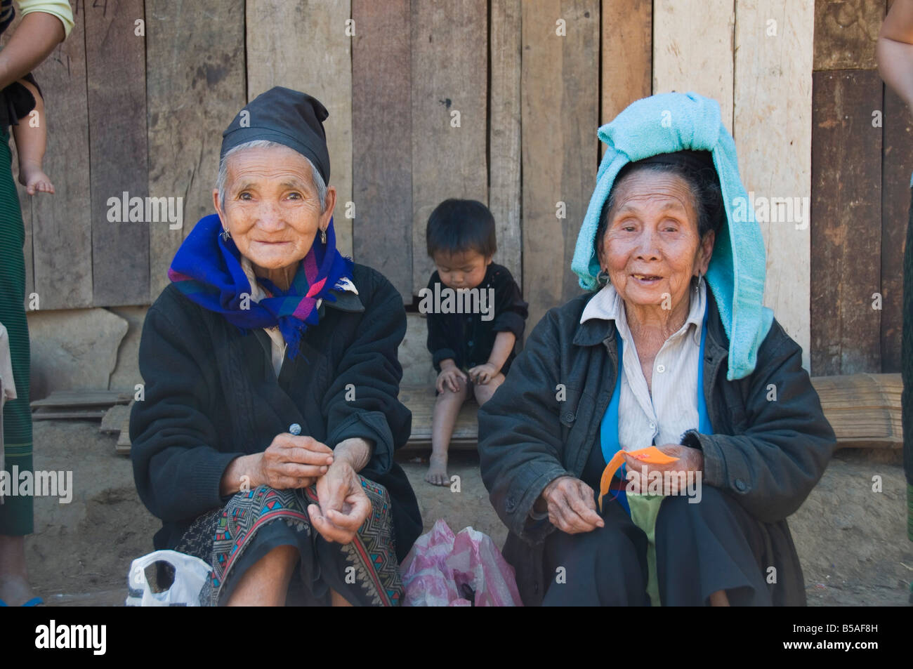 Hmong tribal village women selling handicrafts, Luang Prabang, Laos, Indochina, Southeast Asia Stock Photo