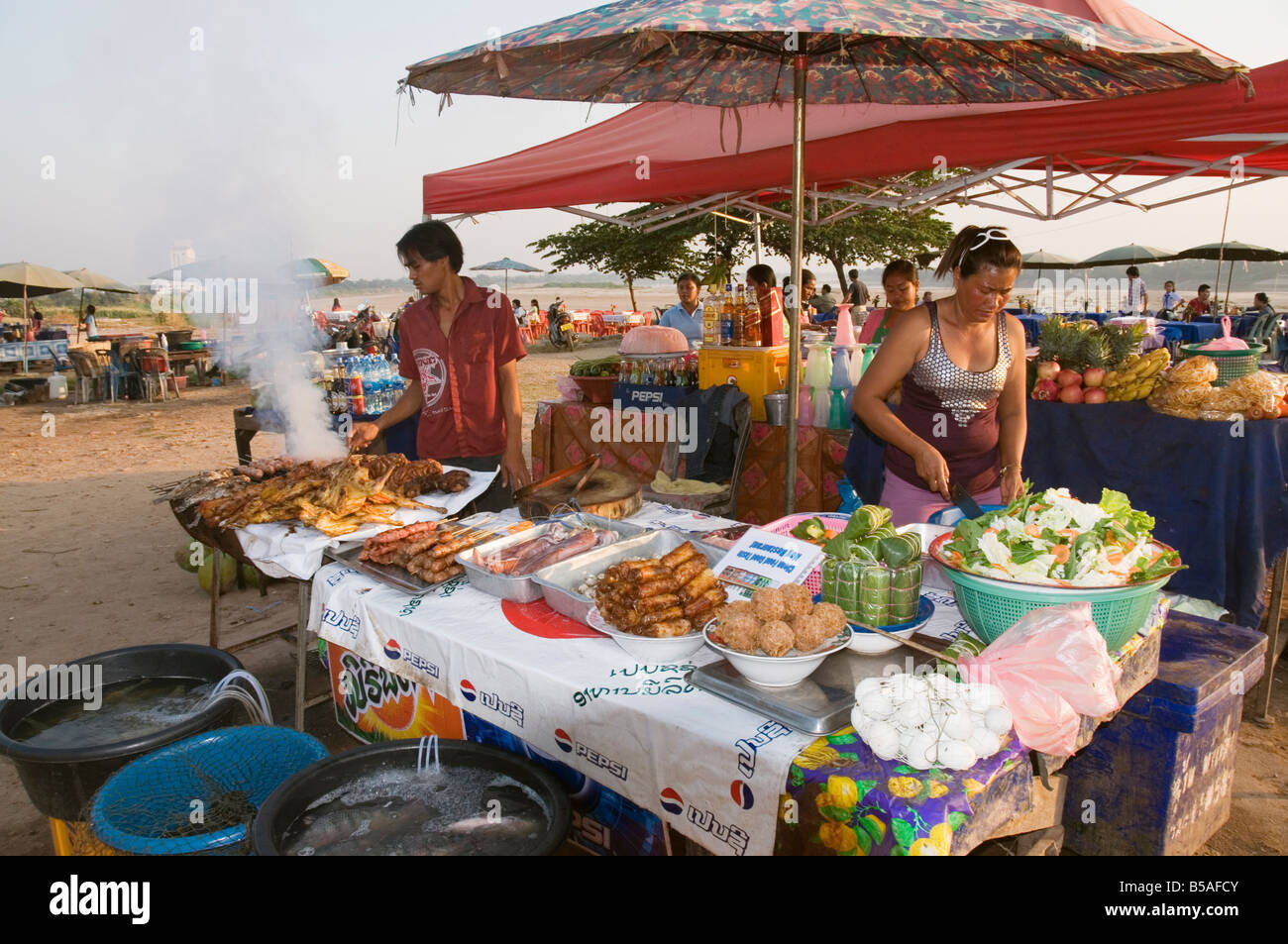 Food stalls on side of Mekong River, Vientiane, Laos, Indochina, Southeast Asia Stock Photo