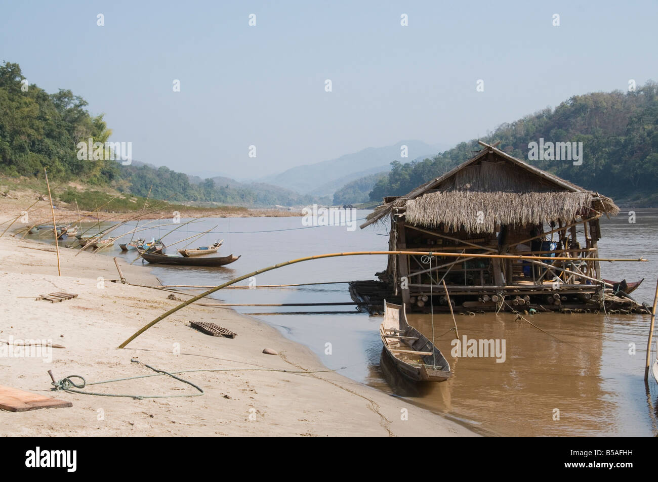 Floating shop on Mekong River, near village, Laos, Indochina, Southeast Asia Stock Photo
