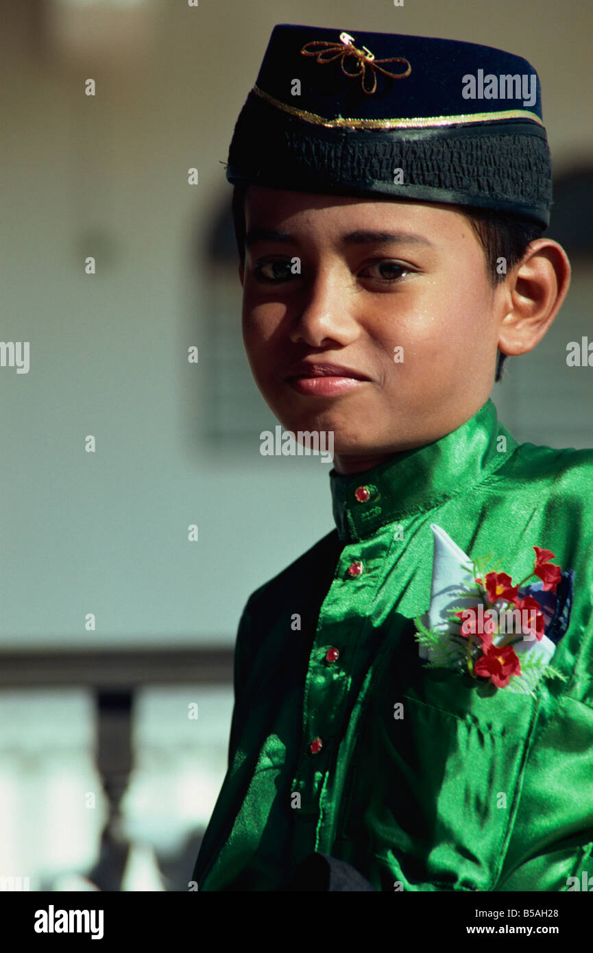 Boy in traditional costume east coast Malaysia Southeast Asia Asia